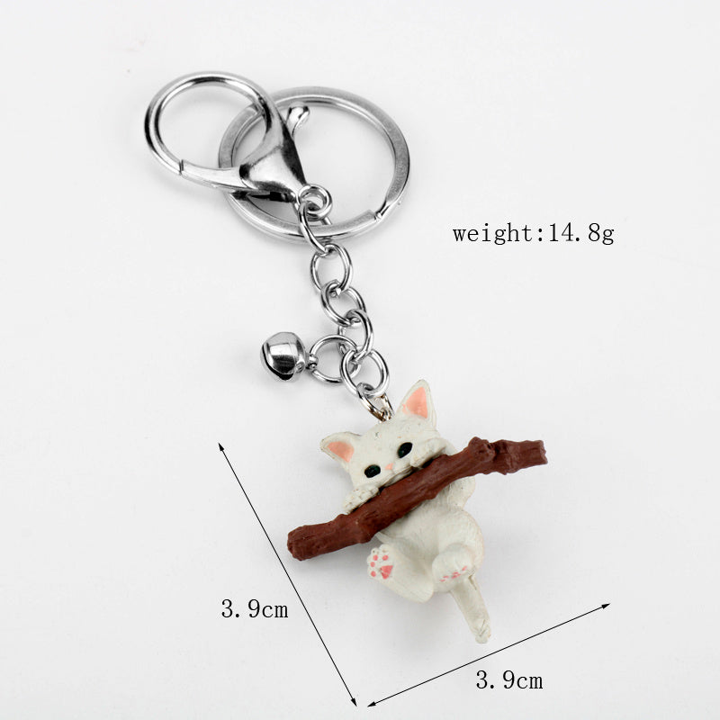 Keychain for holding tree branch cat doll